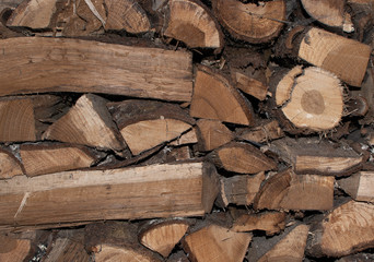 wooden logs, stacked and cut transversely