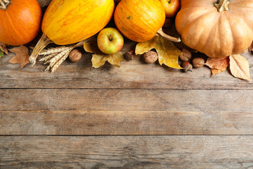 Autumn vegetables on wooden background, flat lay with space for text. Happy Thanksgiving day
