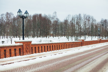 Winter image of Kuldiga's old brick bridge across the Venta river, it was built in 1874 and is the...