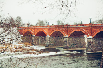 Kuldiga's old brick bridge across the Venta river was built in 1874 and is the longest bridge of...