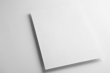 Blank paper sheet on white background. Mock up for design
