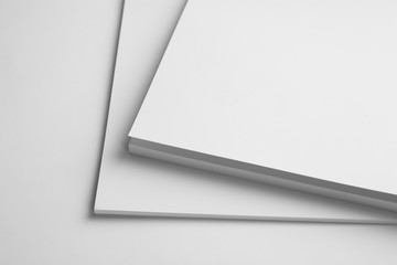Blank books on white background, closeup. Mock up for design