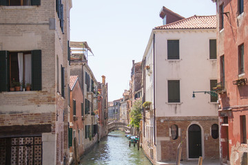 Fototapeta na wymiar Beautiful view of the Venetian canals in Venice, Italy
