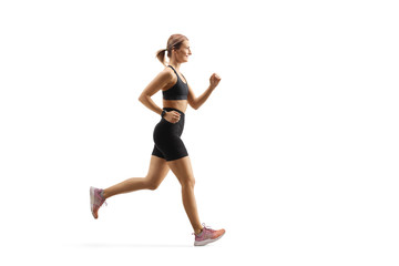 Fototapeta na wymiar Fit young woman jogging