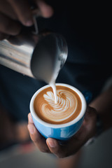 coffee latte art make by barista - obrazy, fototapety, plakaty