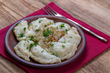 Dumplings stuffed with potato. Healthy vegetarian homemade food, ukraine cuisine, closeup