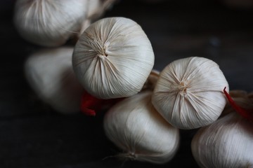 Artificial vegetable garlic and pepper on the table