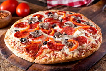 Deluxe Brick Oven Baked Pizza