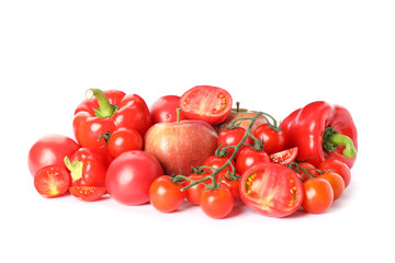 Tomatoes, apples and peppers isolated on white background