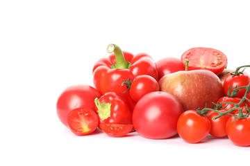 Tomatoes, apples and peppers isolated on white background