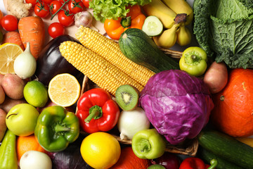 Vegetables and fruits texture on whole background, close up