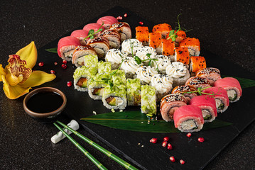 tasty sushi on the black background