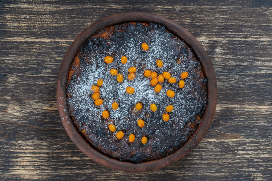 Sweet Casserole With A Burnt Crust On Wooden Table. Ceramic Bowl With Baked Cottage Cheese Casserole , Close Up