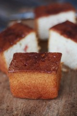 Delicious cake with jam on the table