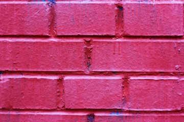 Pink brick wall of the house close up 