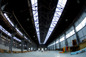 Fototapeta premium Empty factory building or warehouse building with concrete floor for industry background.