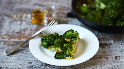 Broccoli omelet on a plate. Fresh homemade frittata with broccoli. Keto diet.