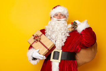 Santa holding a sack filled with Christmas presents