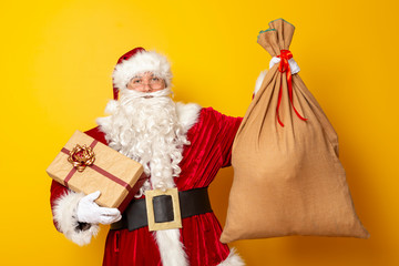 Santa Claus holding a sack of Christmas presents