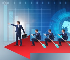 Team of businessmen in teamwork concept with boat