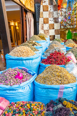 Blue sacks with aromatic herbs in the market of Marrakech