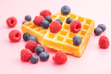 Waffles with blueberries and raspberries.