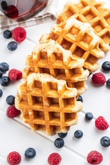 Waffles with blueberries and raspberries.