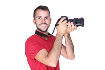 Fototapeta na wymiar Young photographer with camera on white background