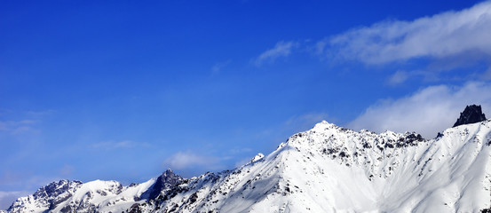 Snow mountain at sunny winter day