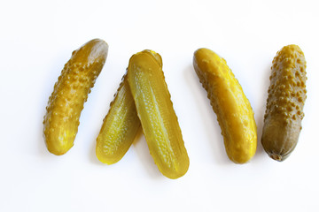 Pickled cucumbers on a white background