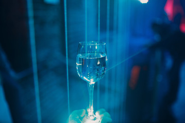Transparent drink glass and laser beams