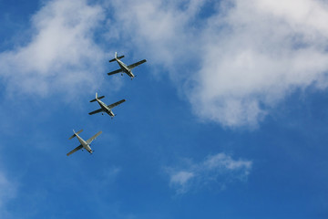 Plane made artificial rain in blue sky airplane fly bright air