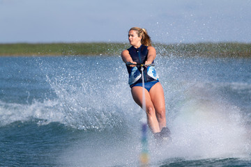 A woman waterskiing.