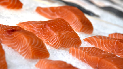 Gorgeous pieces of fresh raw salmon fillet ready for cooking