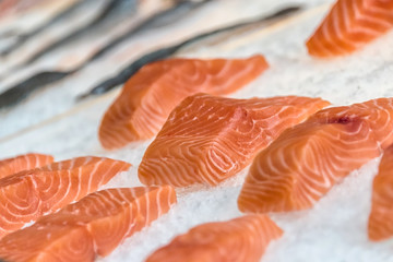 Gorgeous pieces of fresh raw salmon fillet ready for cooking