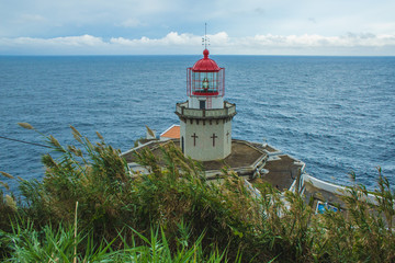 Fototapeta na wymiar Lighthouse Arnel near Nordeste on Sao Miguel Island, Azores, Portugal