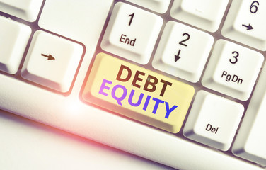 Text sign showing Debt Equity. Business photo showcasing dividing companys total liabilities by its...