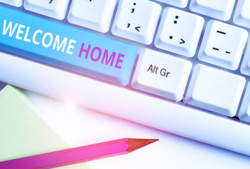 Handwriting text Welcome Home. Conceptual photo Expression Greetings New Owners Domicile Doormat Entry White pc keyboard with empty note paper above white background key copy space