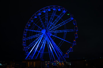 Picture of ferris wheel against background of night sky