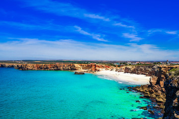 Obraz na płótnie Canvas View on coastline with ocean and beach next to Sagres at Algarve in Portugal