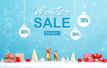 Winter sale message with reindeer and Christmas gifts in snowy day