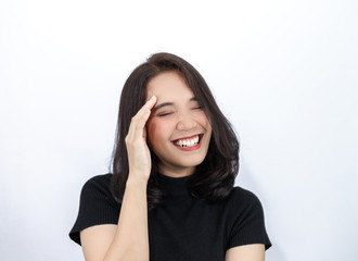 Short haired girl Wearing a black T-shirt Laughing joyfully on the White Blackground