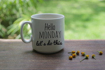 Monday motivational greeting & notes on white mug of coffee - Hello Monday., lets do this. With...