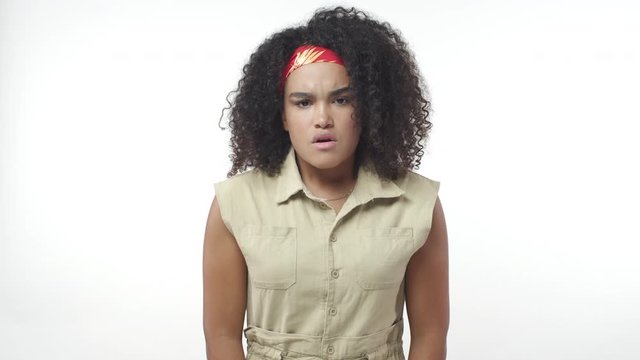 Angry intense girl cant hold rage anymore, release negative emotions, shouting, clench hands and pull hair from head, cursing disappointed, distressed losing control, freak out and swearing