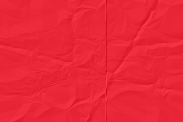 crumpled red paper background close up