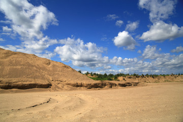 Sand quarry mining and blue sky