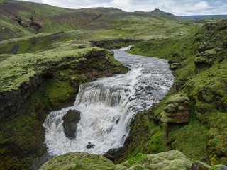 Beautifull waterfall on the Skoga River with rainbow and no people on famous Fimmvorduhals trail...