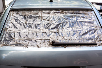broken rear window of the car adhesive tape, damaged window insurance case.