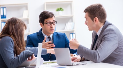 Business meeting with employees in the office