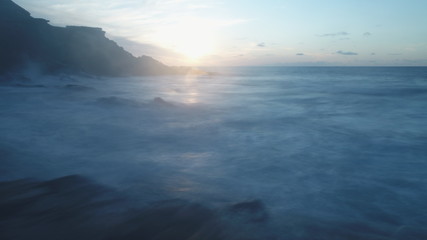 Fototapeta premium sunset from the north coast with the sea and the silk effect